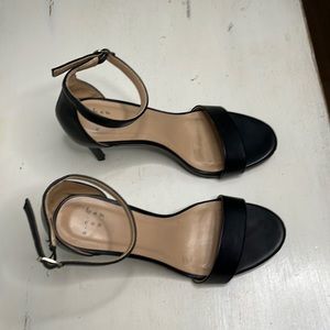 Black scrappy heels.